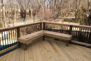 Inspiration for a mid-sized rooftop deck remodel in Other with no cover