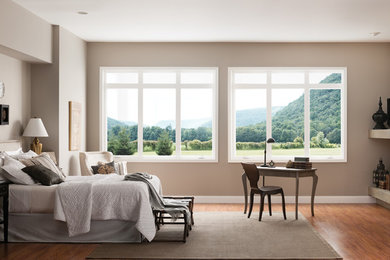 Inspiration for a mid-sized transitional master dark wood floor and brown floor bedroom remodel in Other with brown walls and no fireplace