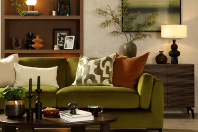 Contemporary formal enclosed living room with beige walls, laminate floors, no tv, beige floors and feature lighting.