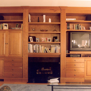 Various custom fireplace mantles, bookcases, and entertainment centers.