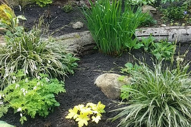 Photo of a rustic shade landscaping in Vancouver for spring.