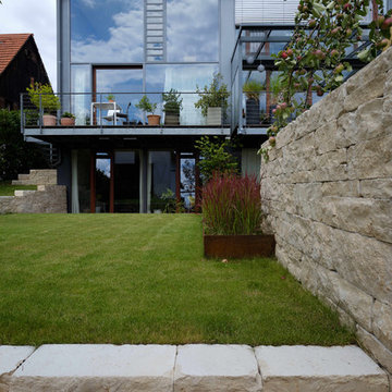 Moderne und offene Gartenanlage für ein Architektenhaus