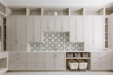 Inspiration for a transitional laundry room in Tampa.