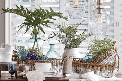 Mid-sized beach style great room photo in Wilmington with white walls