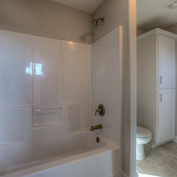 Custom Newport w/ side-load garage and master w/ sitting room