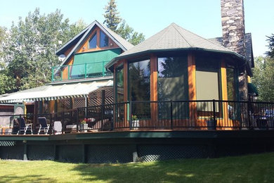 Inspiration for a timeless backyard deck remodel in Other with no cover