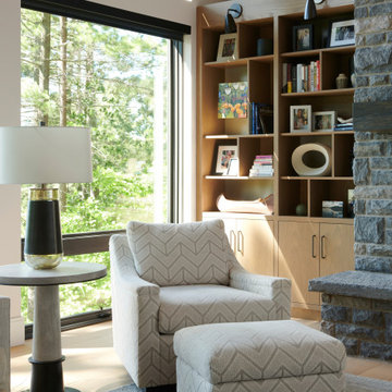 Modern Functionality With Custom-Made White Oak Bookshelf in Cottage Living Room