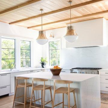 White Kitchen with Cypress Ceiling Plaster Hood