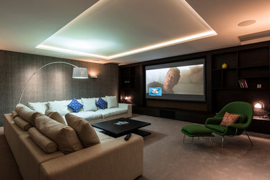 Photo of a contemporary home theatre in London.