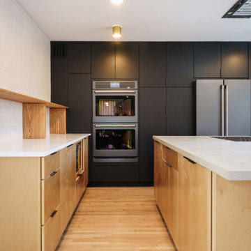 Sleek Contrast: Modern Black & Maple Kitchen
