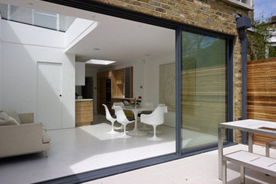 This is an example of a medium sized scandinavian house exterior in London.