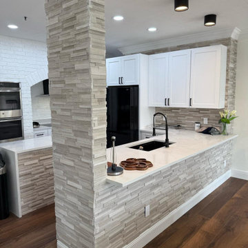 **Complete Kitchen, Flooring, Complete Stair Case and Trim
