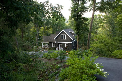 Black two-story wood exterior home photo in Charlotte