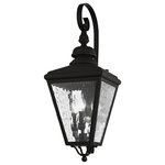 Livex Lighting Lights - Cambridge Outdoor Wall Lantern, Black - This stylish black outdoor wall lantern is a great way to update your home's exterior decor. A flat metal curved arm attaches the solid brass decorative housing to the square backplate while clear water glass protects the three bulbs.