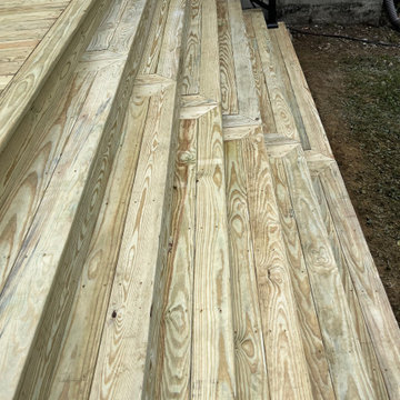 Large pressure treated wood deck
