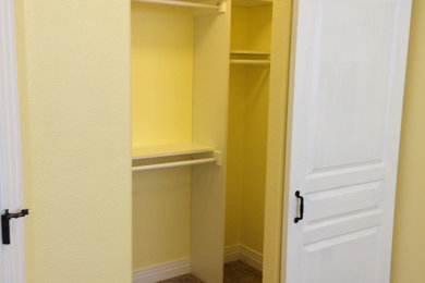 Example of a trendy closet design in Denver
