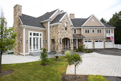 Large transitional three-storey beige house exterior in Boston with mixed siding, a gable roof and a tile roof.