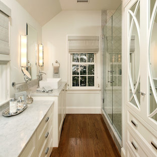 Inspiration for a timeless dark wood floor and brown floor bathroom remodel in DC Metro with a vessel sink
