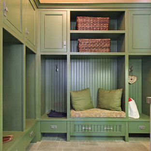 Mid-sized arts and crafts mudroom in San Diego with green walls, grey floor and limestone floors.