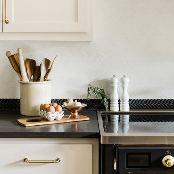 Elegantly Subtle Herringbone Stone Backsplash Mosaic