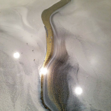 charcoal, silver, and black gold veins