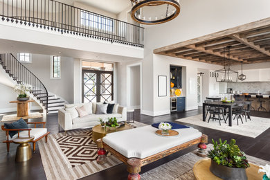 Living room - large country formal and open concept dark wood floor, brown floor and exposed beam living room idea in Other with white walls, a standard fireplace, a tile fireplace and a concealed tv