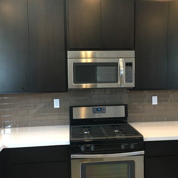 KITCHEN - Backsplash - Brown Glass Subway tile / Counter-to-Ceiling @ Window