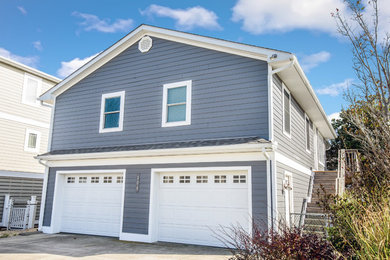 Example of a classic exterior home design in Other