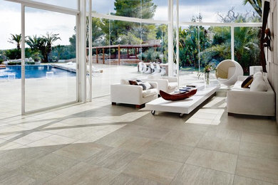 Inspiration for a huge contemporary travertine floor sunroom remodel in Dallas with a glass ceiling