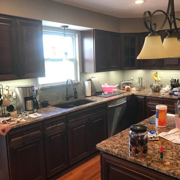 Kitchen remodel--maple capinets with granite and glass backsplash