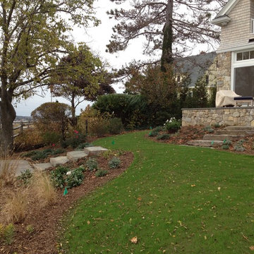 Steps transition from house terrace to seaside terrace.