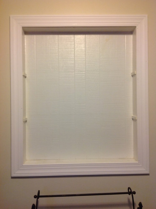 An old window hole in living room...what should we do?