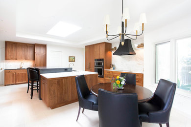 Mid-century modern kitchen photo in Denver