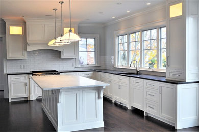 Example of a transitional kitchen design in New York
