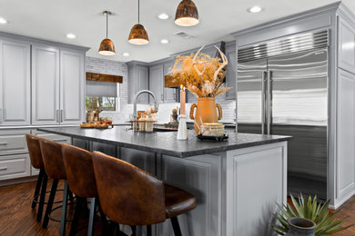 Example of a mountain style kitchen design in Dallas
