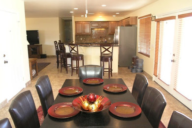 Inspiration for a mid-sized transitional travertine floor and beige floor enclosed dining room remodel in Phoenix with beige walls