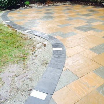 Sandstone patio with recessed lights