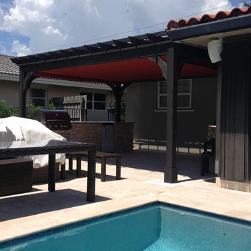 Outdoor Kitchen with Pergolas and Sunshade