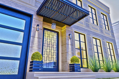 Large elegant beige two-story brick house exterior photo