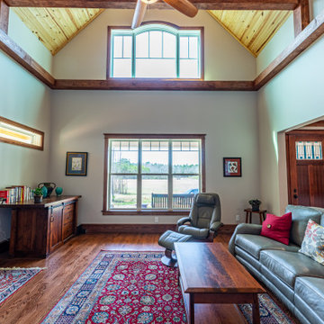 Clerestory windows complement floor-level windows in living room