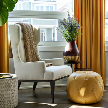 Comfy Custom Reading Chair with Orange Leather Ottoman.