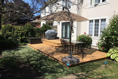 Elegant patio photo in Other
