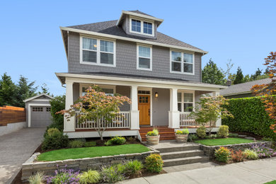 Example of a large cottage gray two-story wood and shingle house exterior design in Salt Lake City