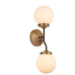 Lighting Favorites - 2- Light Bubble Glass Aged Brass and Black Armed Wall Sconce - This regal, retro-inspired two-light wall sconce may be mounted with either side facing up in a hallway, bathroom, or accent wall. The frosted bubble glass shades are on trend and decoratively attached with the traditional glass screws showing off our attention to detail. The Aged Brass and matte black mixed finish adds a contemporary elegance to this updated and sophisticated lighting design. Notice the slight bend in the bar adding a small detail for a touch of classic design.  This wall sconces uses 2 - 60 watt max E12 candelabra based bulbs (not included), and is LED compatible.  Reverse mounting is also a possibility for this fun wall sconce.