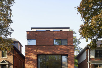 Example of an exterior home design in Toronto