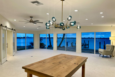 Mid-century modern living room photo in Tampa