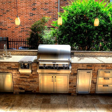 Grand home addition with outdoor kitchen see through fireplace - km