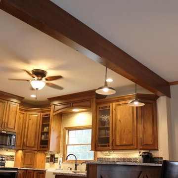 Rural Kewanee Kitchen Remodel With Rustic Beech Cabinets and White Sand Granite