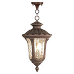 Livex Lighting - Oxford Outdoor Chain-Hang Light, Imperial Bronze - From the Oxford outdoor lantern collection, this traditional design will add curb appeal to any home. It features a handsome, antique-style hanging plate and decorative arm. Light amber water glass  cast an appealing light and lends to its vintage charm. Wall plate, arm and other details are all in a imperial bronze finish.