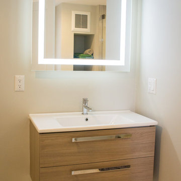 Bathroom Remodel in Lincoln, Ma - Floating Vanity and Backlit Mirror